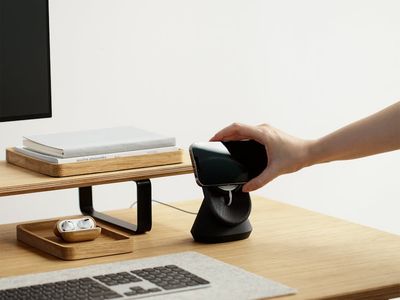 Minimalist desk setup with plants and soft morning light